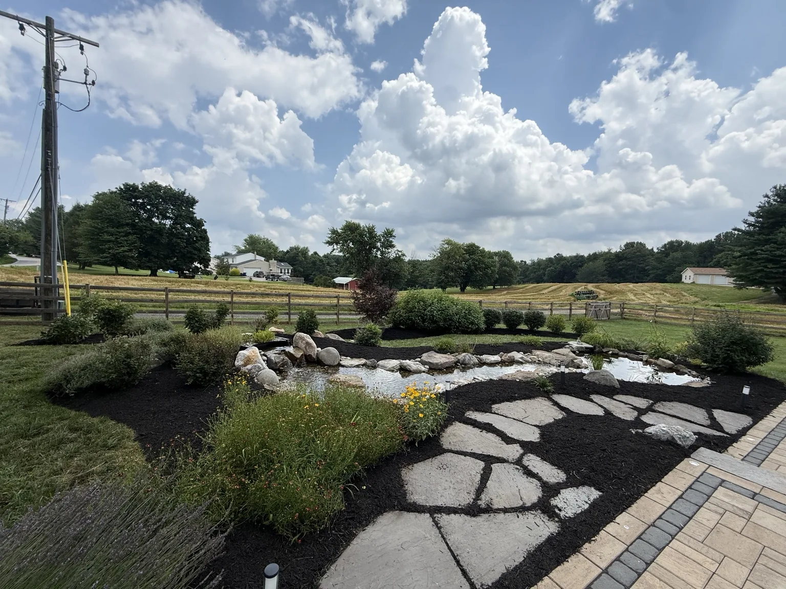Finished pond and landscape design
